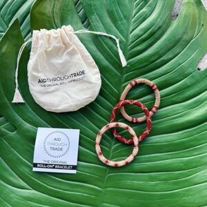 Aid Through Trade Stack of 3 Pink and Red Roll On Bead Bracelets - Got it for $4